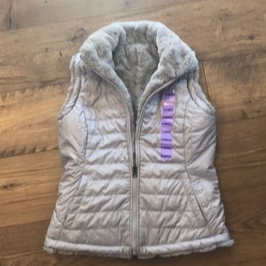 Ladies reversible vest, new but no tags